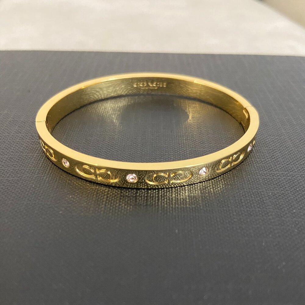 Coach signature hinged bangle